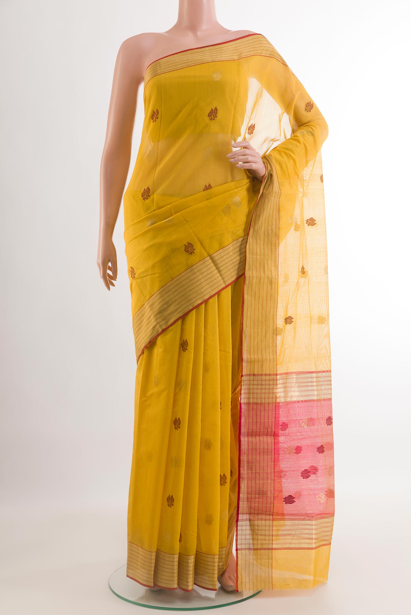Yellow Blended Chanderi Silk Cotton Saree with Zari And Thread Butta on the body and Zari Border.  displayed on a mannequin