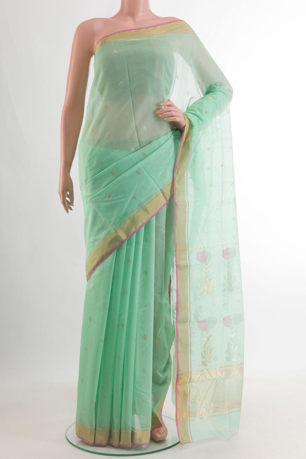 Sea Green Chanderi Cotton Saree with Zari Butta on the body and Zari Border.  displayed on a mannequin