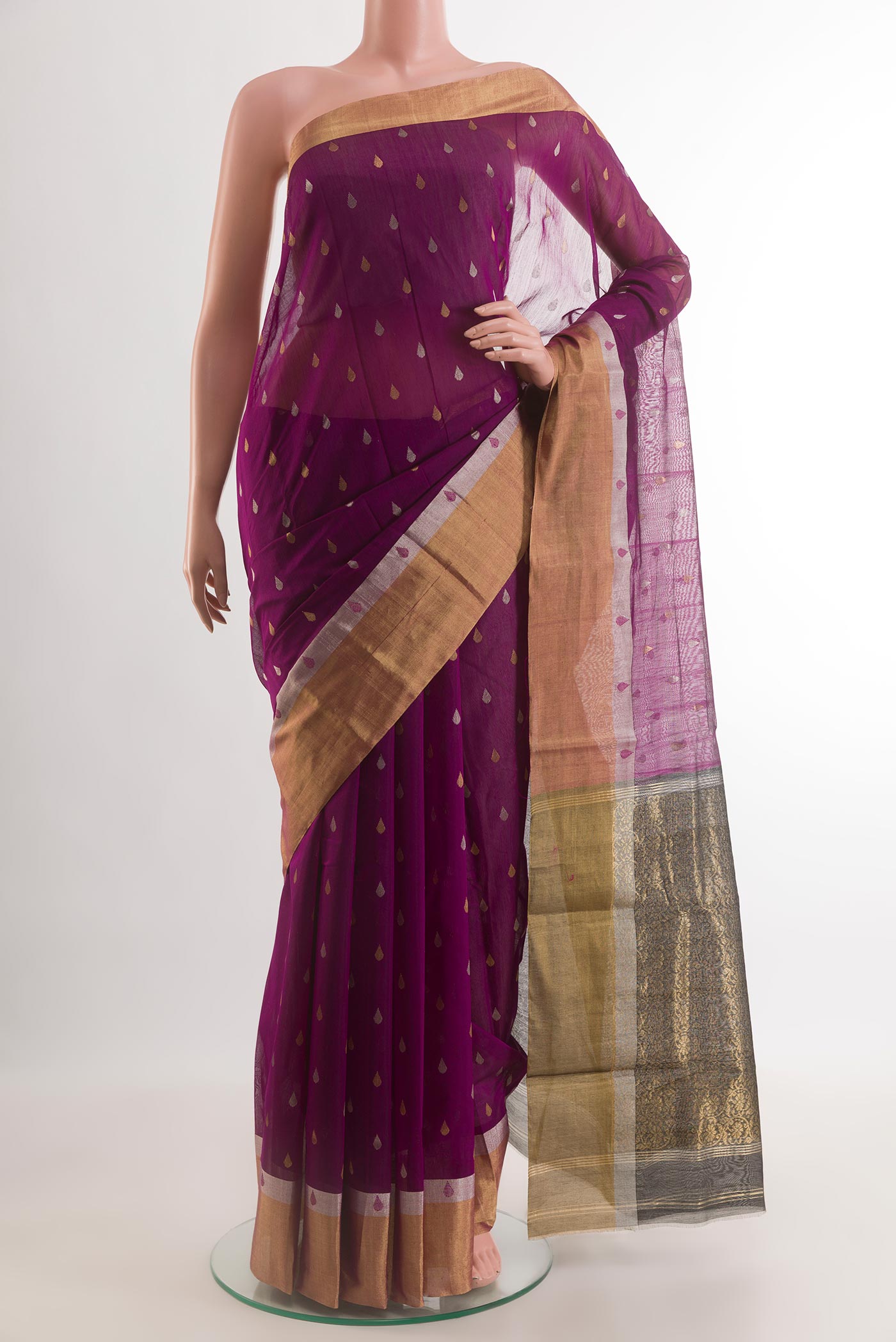 Purple Chanderi Silk Cotton Saree with Zari Butta on the body and Zari Border.  displayed on a mannequin