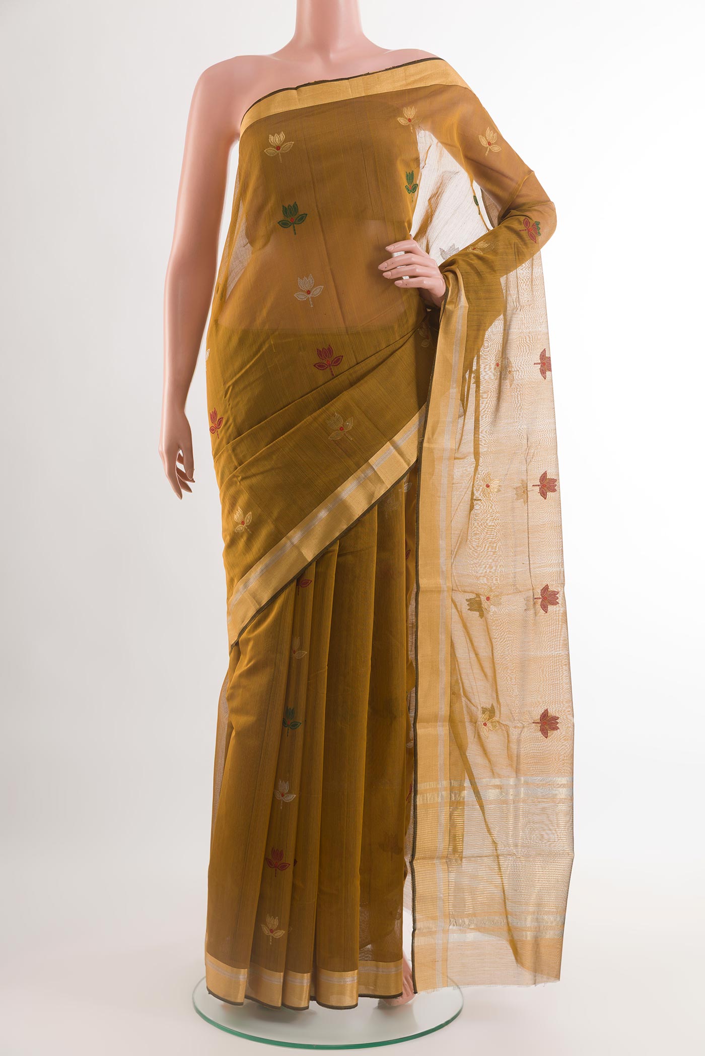 Mehandi Green Chanderi Silk Saree with Zari Butta on the body and Zari Border.  displayed on a mannequin