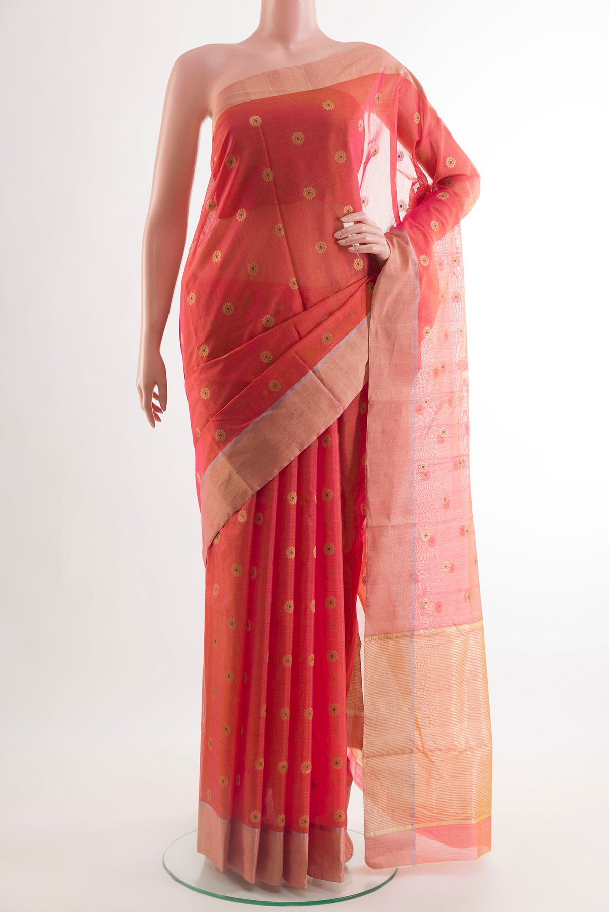Orange Blended Chanderi Silk Cotton Saree with Zari Butta on the body and Zari Border.  displayed on a mannequin