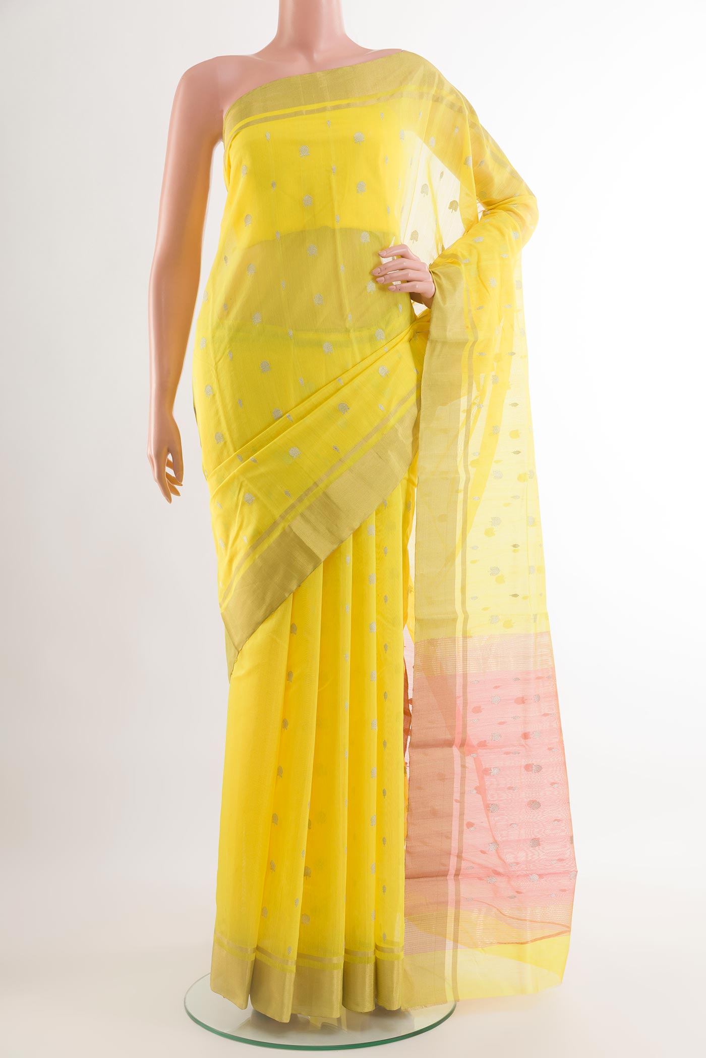 Yellow Chanderi Silk Saree with Zari Butta on the body and Zari Border.  displayed on a mannequin