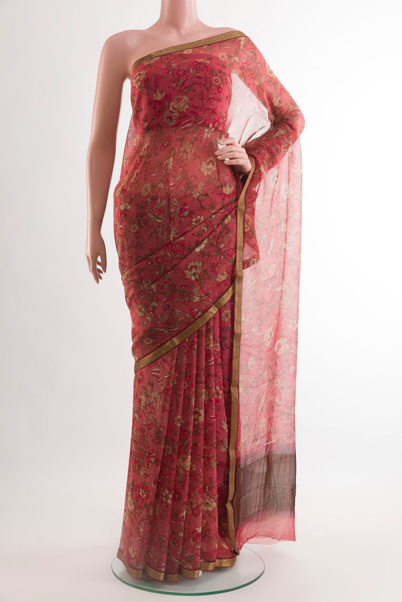 Red Mysore Chiffon Saree with Printed design on the body and Zari Border.  displayed on a mannequin