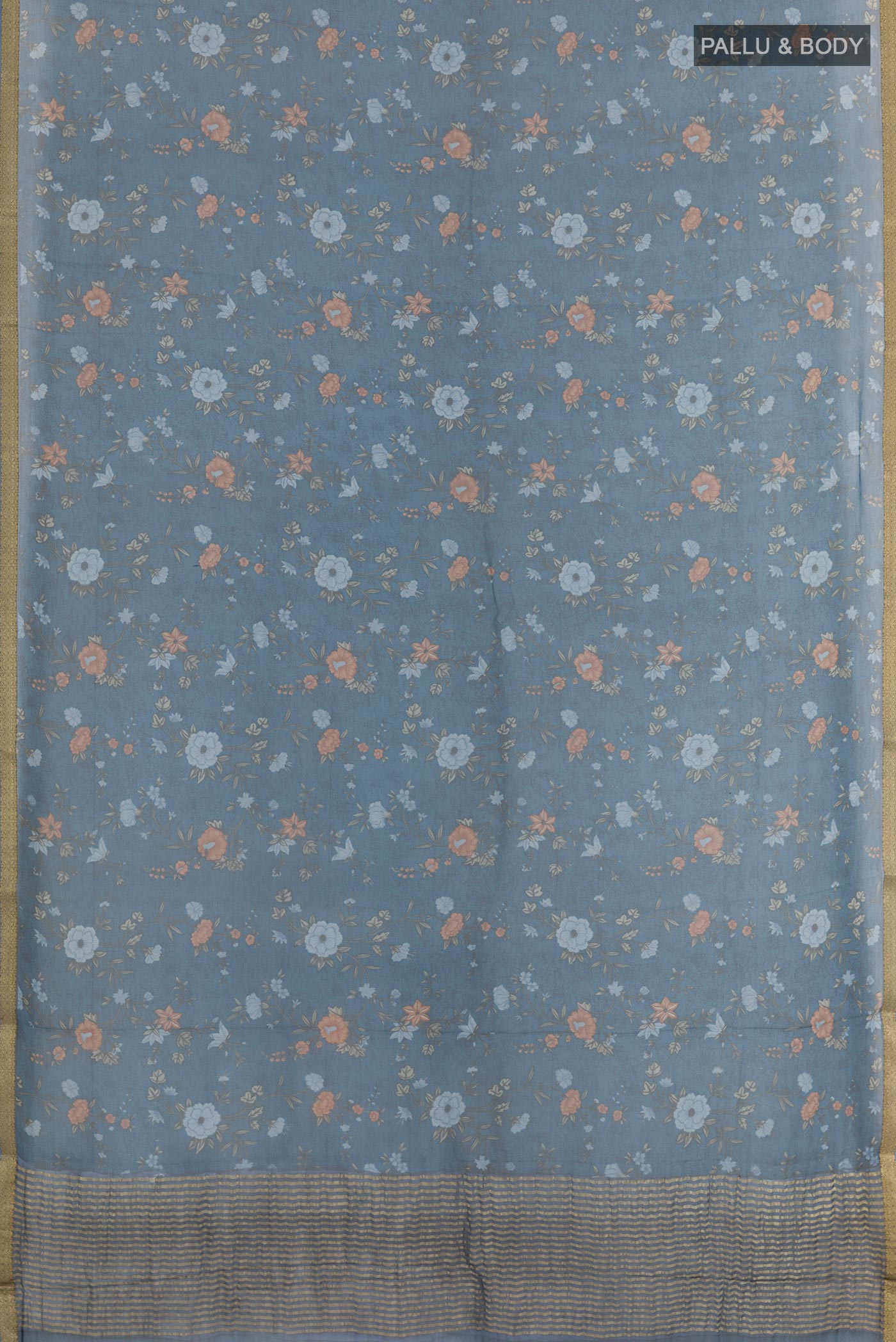 Flat view of Blue Chiffon Saree with Printed design on the body and Plain Border. 