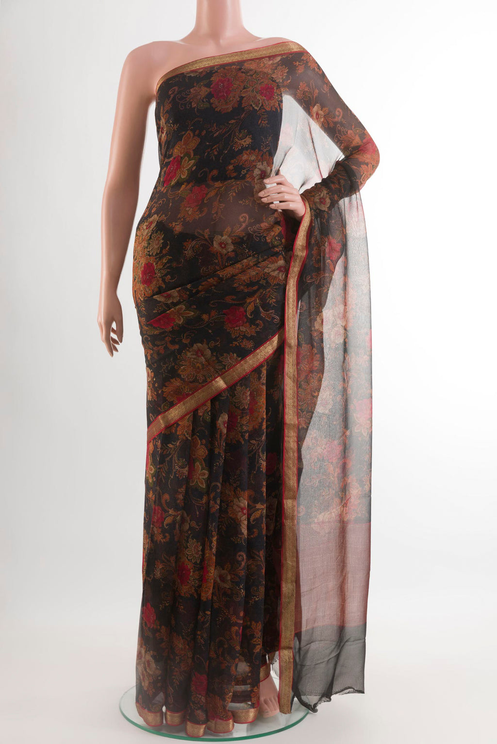 Black Mysore Chiffon Saree with Printed design on the body and Zari Border.  displayed on a mannequin