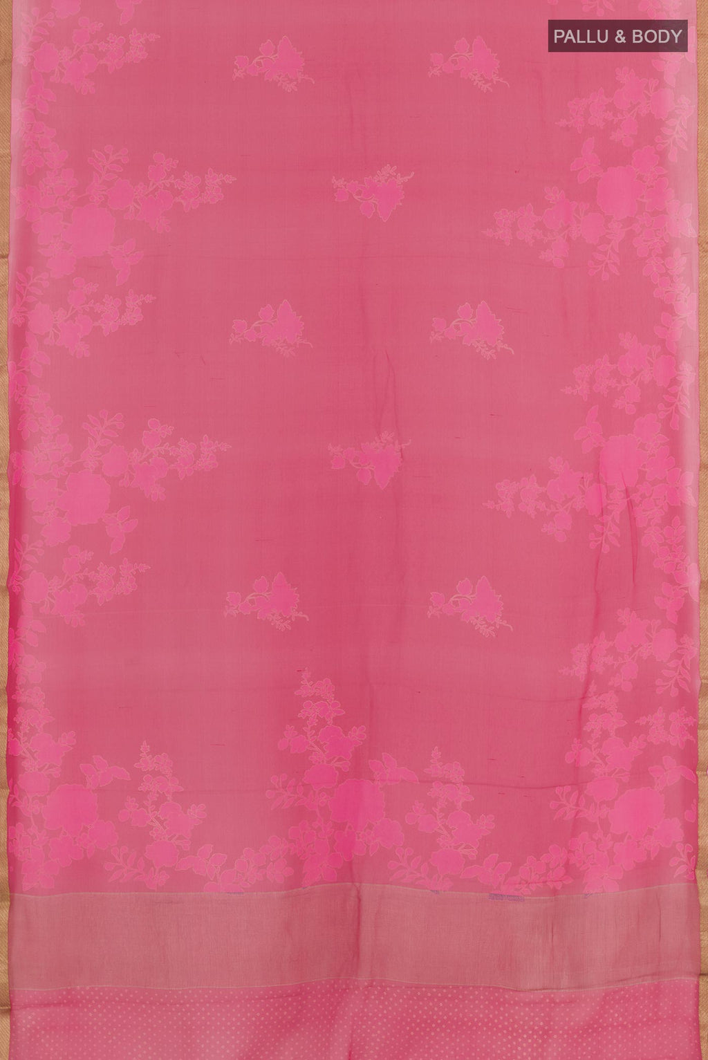 Flat view of Pink Chiffon Saree with Printed design on the body and Plain Border. 