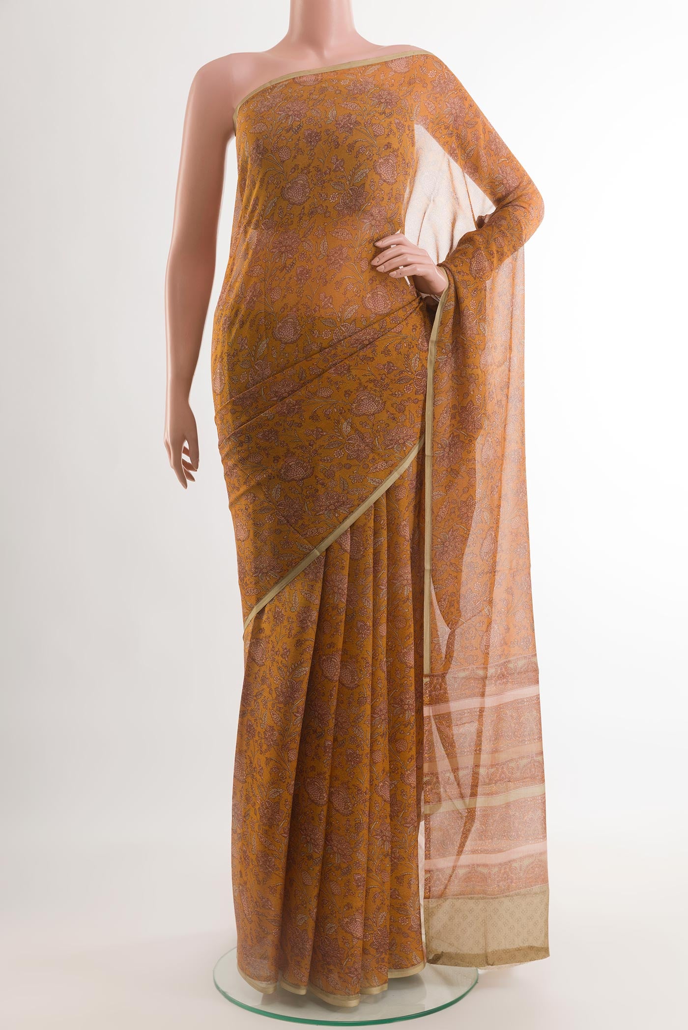 Yellow Chiffon Saree with Printed design on the body and Plain Border.  displayed on a mannequin