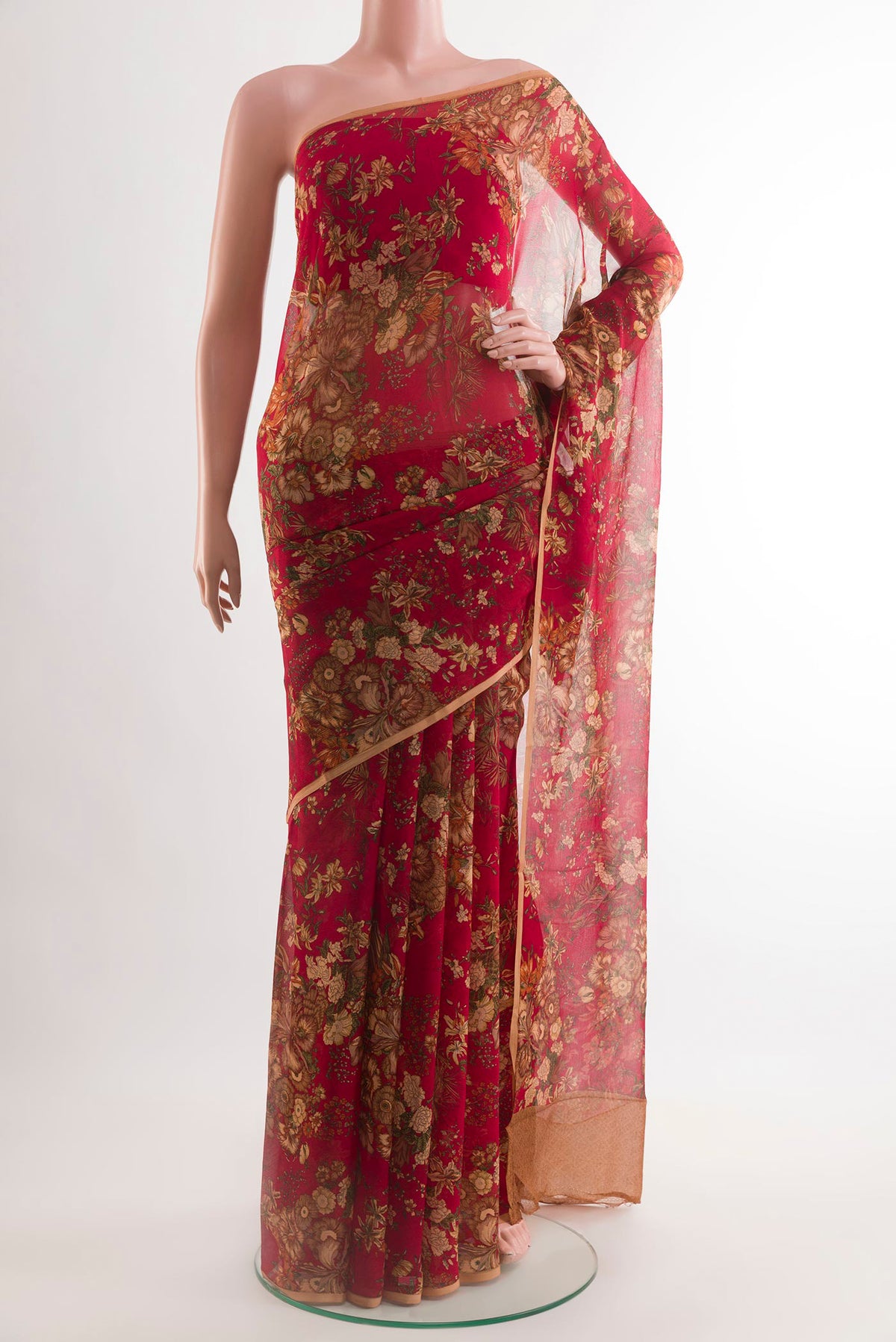 Red Mysore Chiffon Saree with Printed design on the body and Zari Border.  displayed on a mannequin