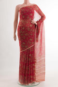 Red Chiffon Saree with Printed design on the body and Plain Border.  displayed on a mannequin