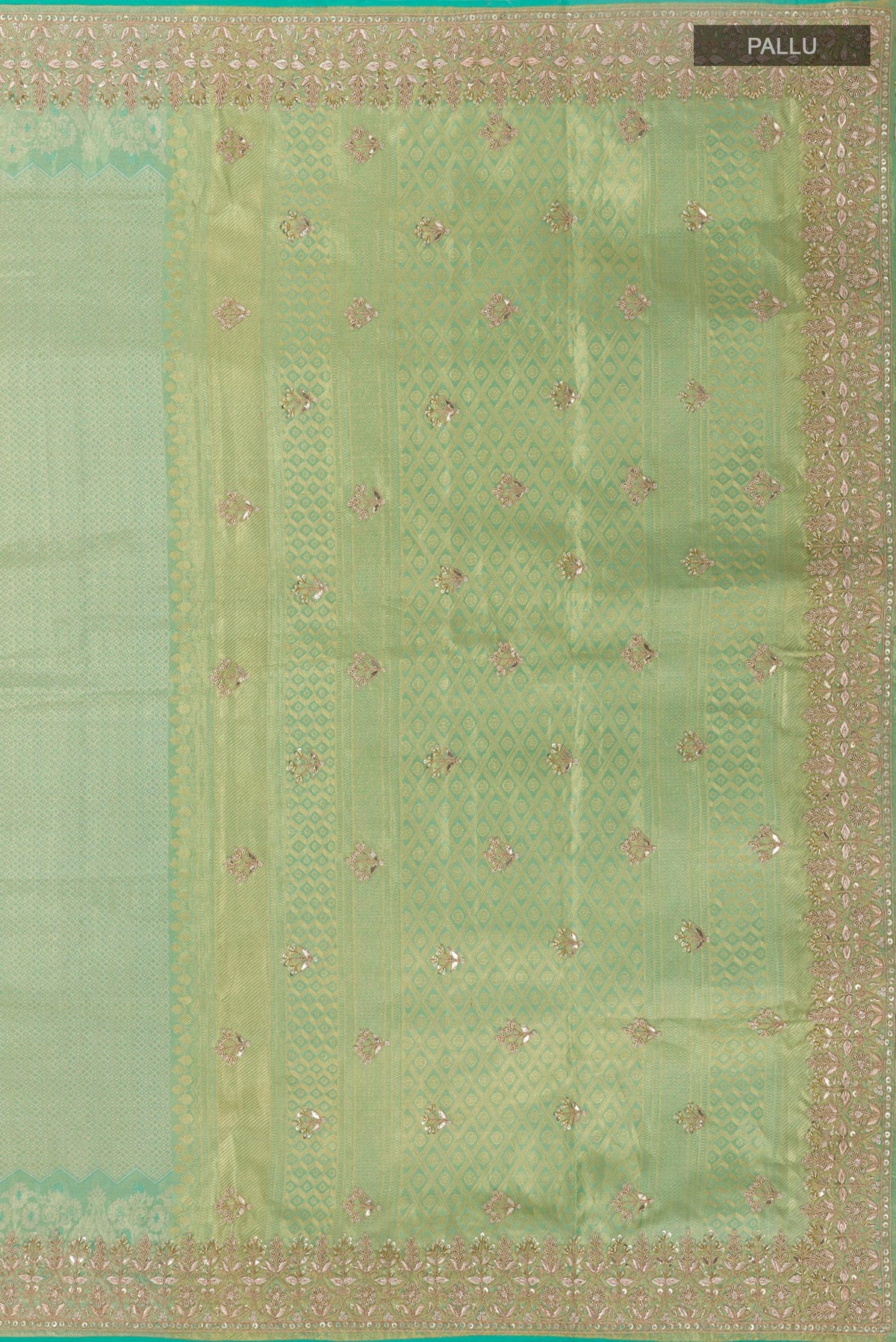 Close up image of the pallu of Sea Green Kanjivaram Tissue Silk Saree with Zari Butta on the body and Embroidery Border. 