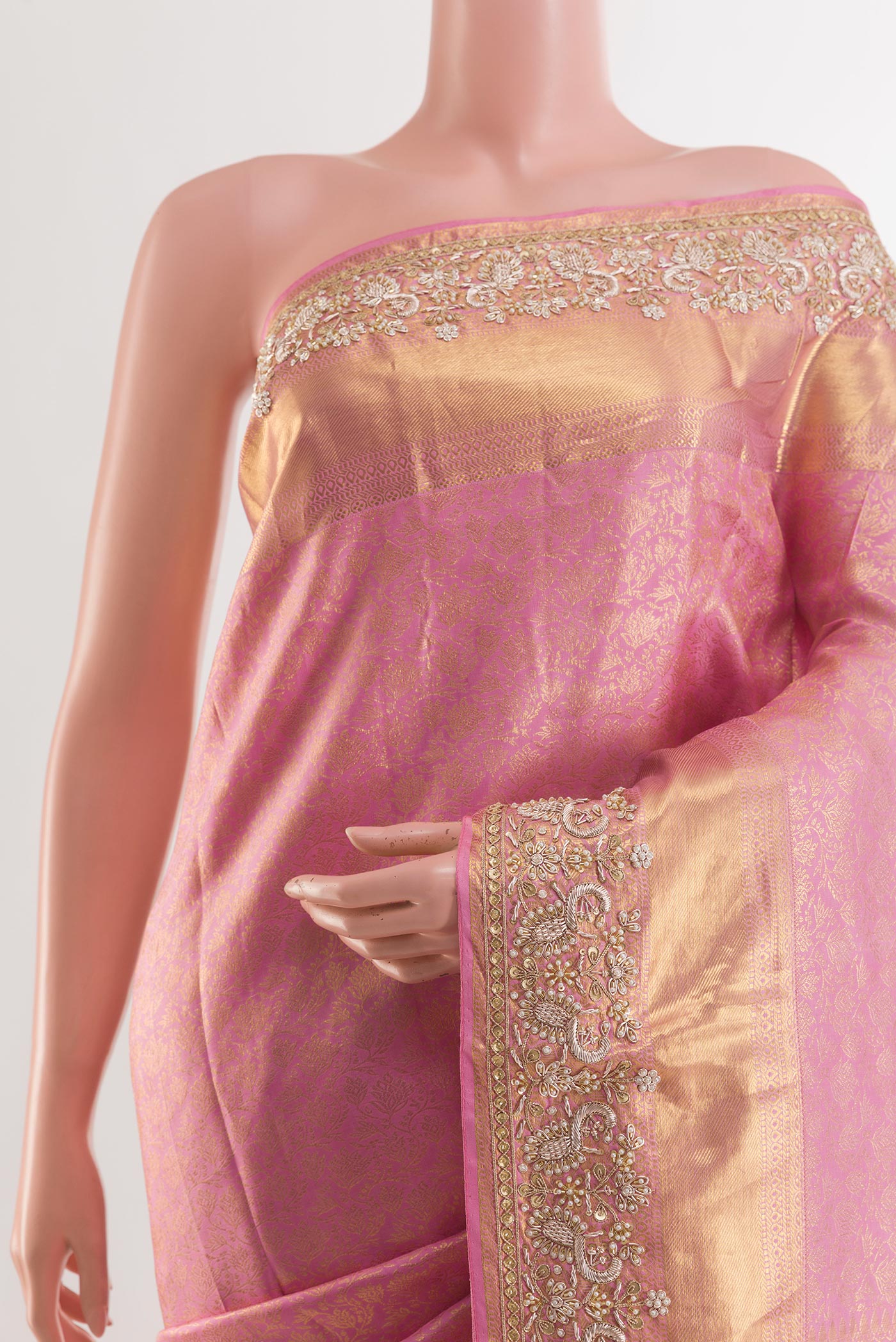 Border image of Pink Kanjivaram Tissue Silk Saree with Zari Butta on the body and Embroidery Border. 