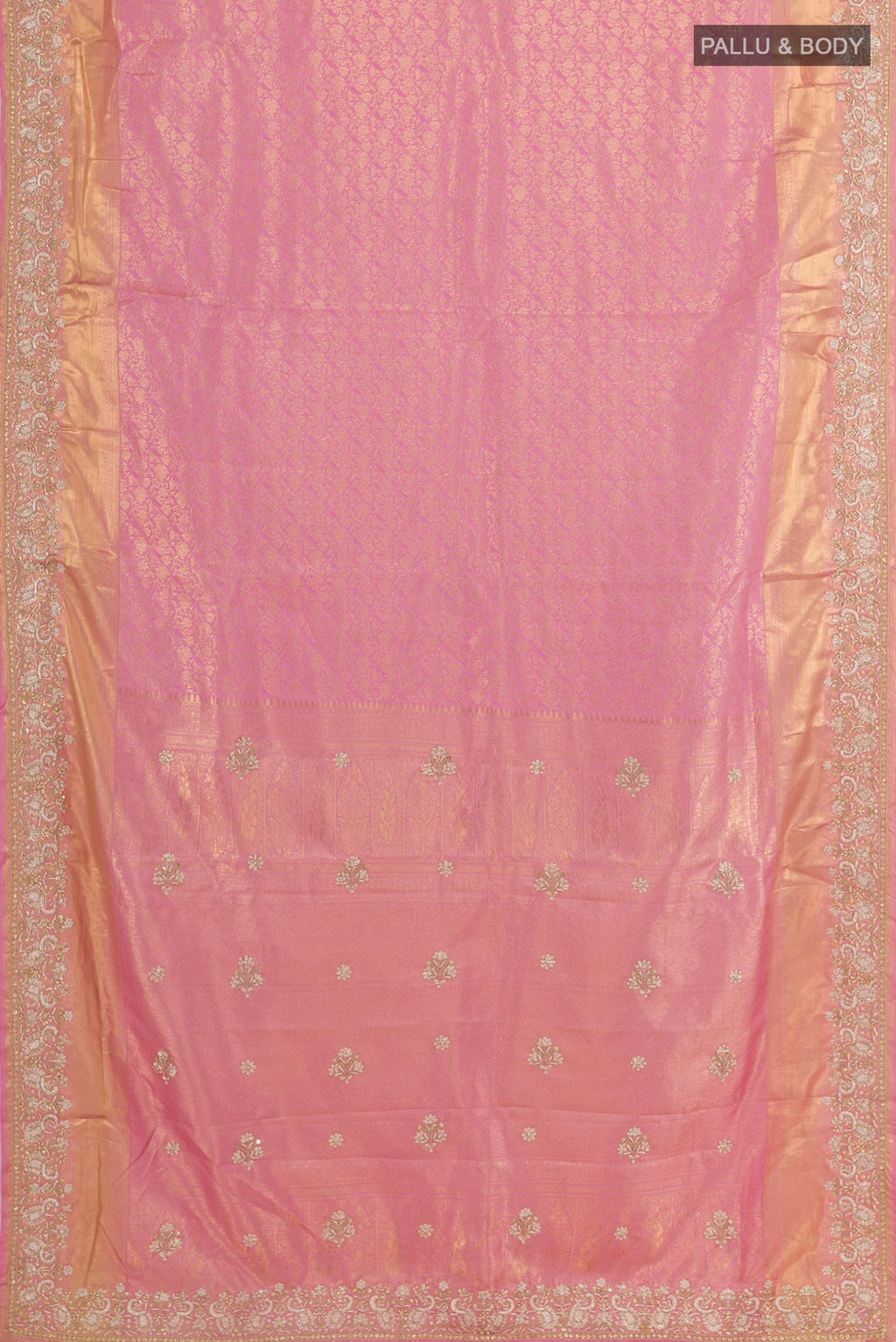Flat view of Pink Kanjivaram Tissue Silk Saree with Zari Butta on the body and Embroidery Border. 