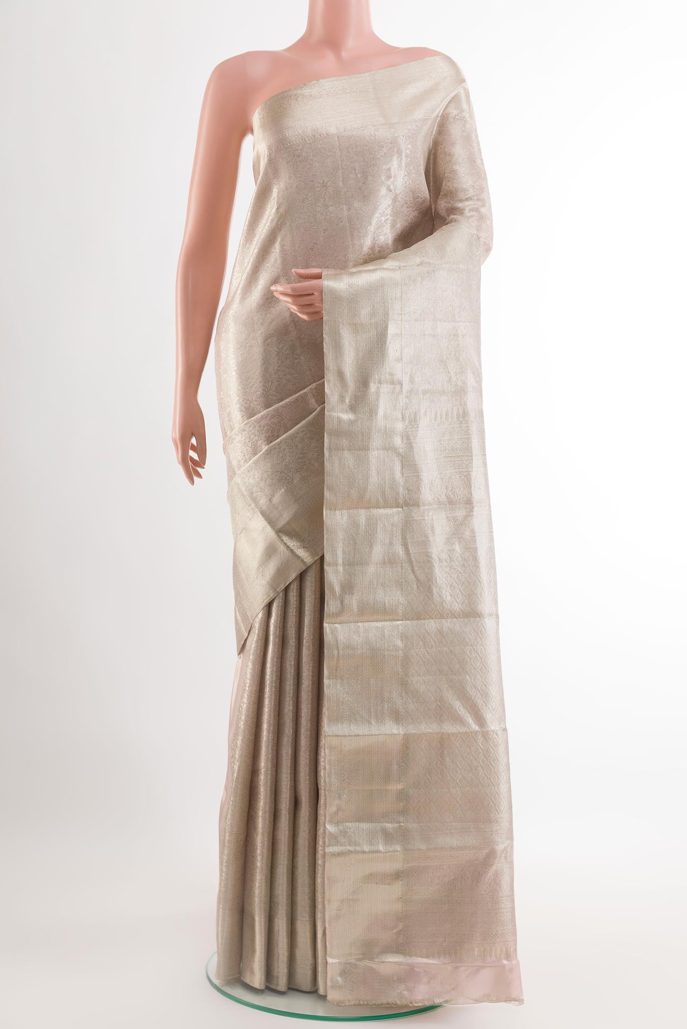Silver Kanchipuram Silk Saree with Zari Brocade on the body and Zari Border.  displayed on a mannequin
