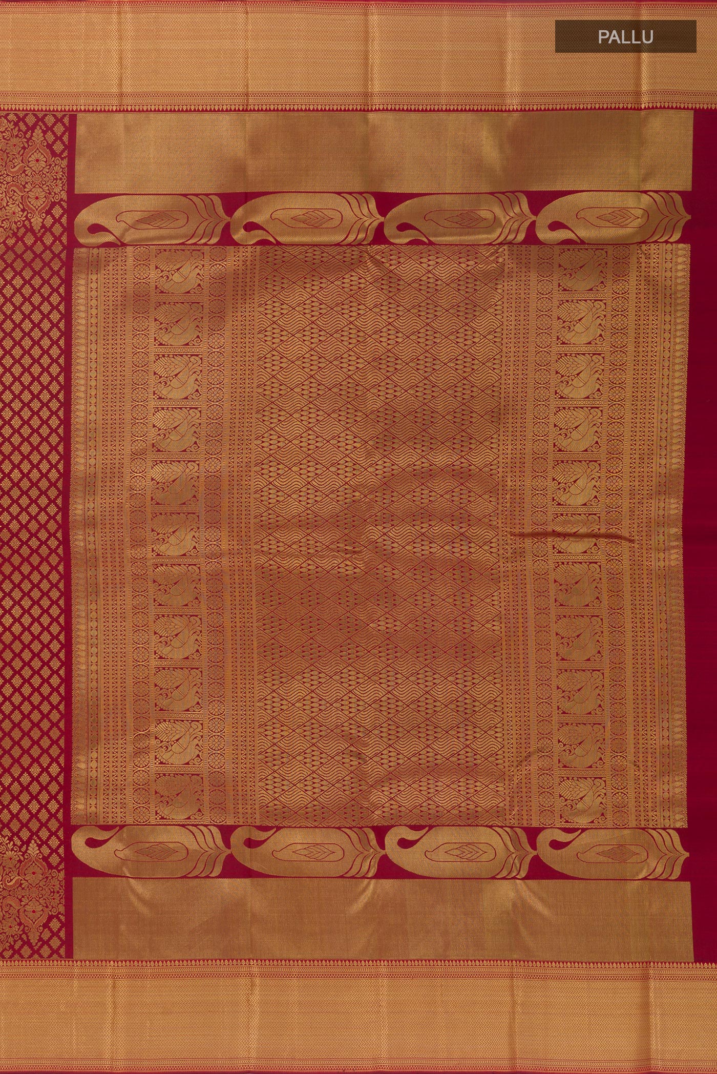 Close up image of the pallu of Maroon Kanjivaram Silk Saree with Zari Brocade on the body and Zari Border. 