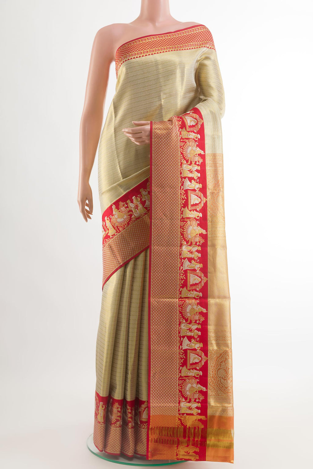 Golden Kanjivaram Silk Saree with Zari Brocade on the body and Zari Border.  displayed on a mannequin