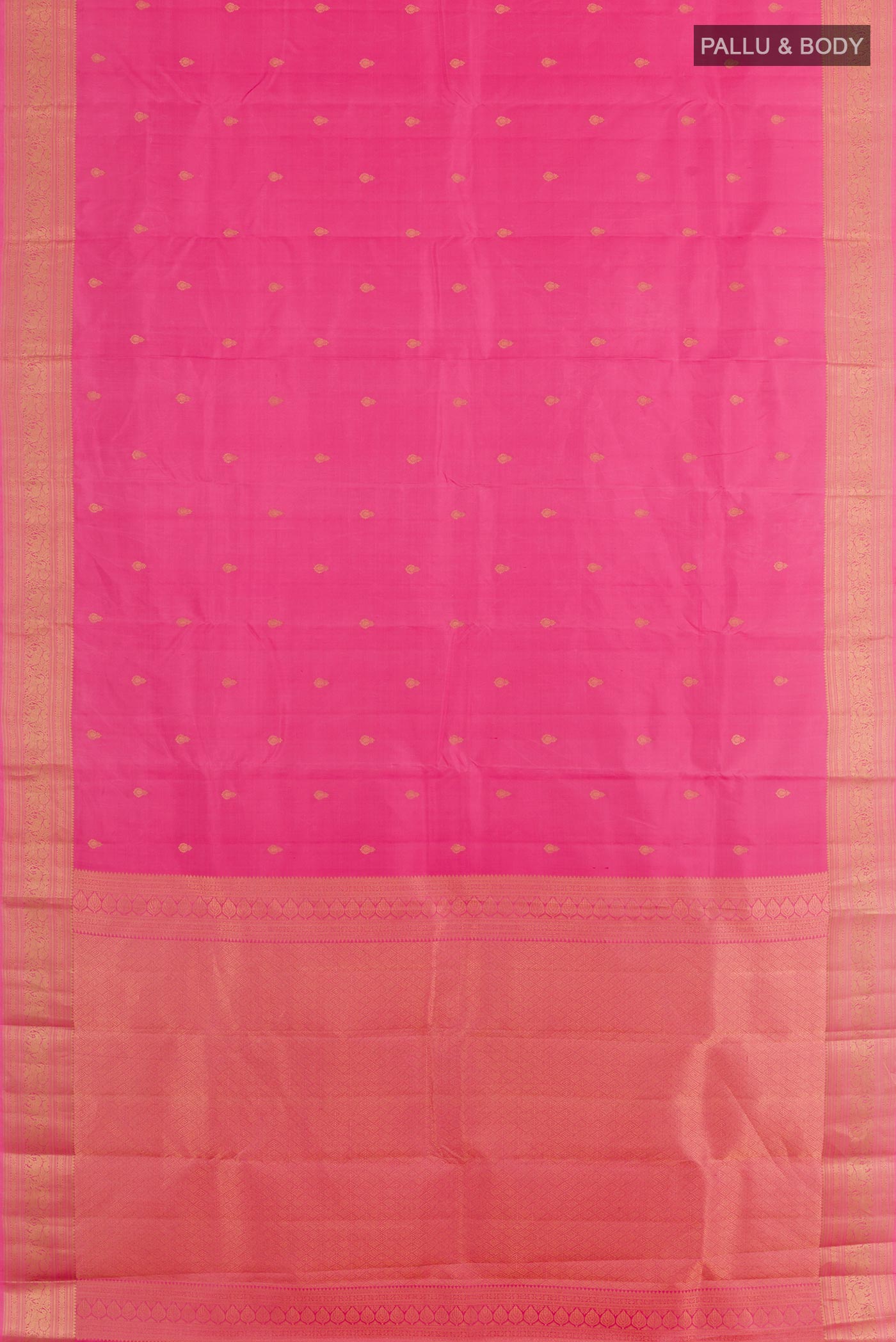 Flat view of Pink Kanchipuram Silk Saree with Zari Butta on the body and Zari Border. 