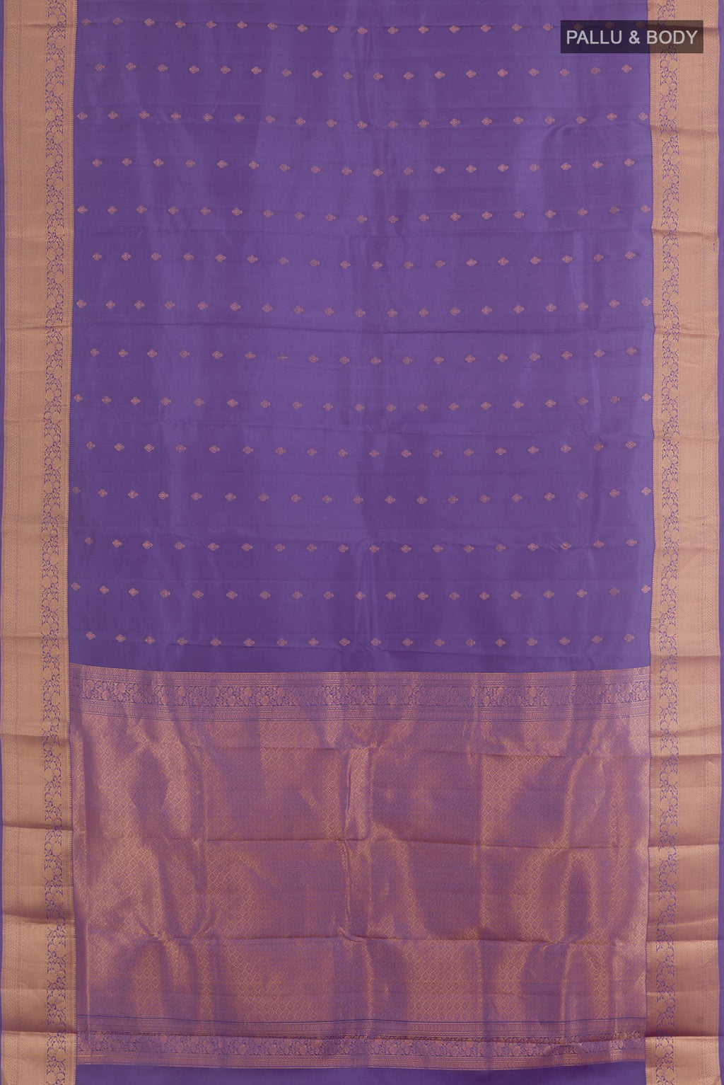 Flat view of Purple Kanchipuram Silk Saree with Zari Butta on the body and Zari Border. 