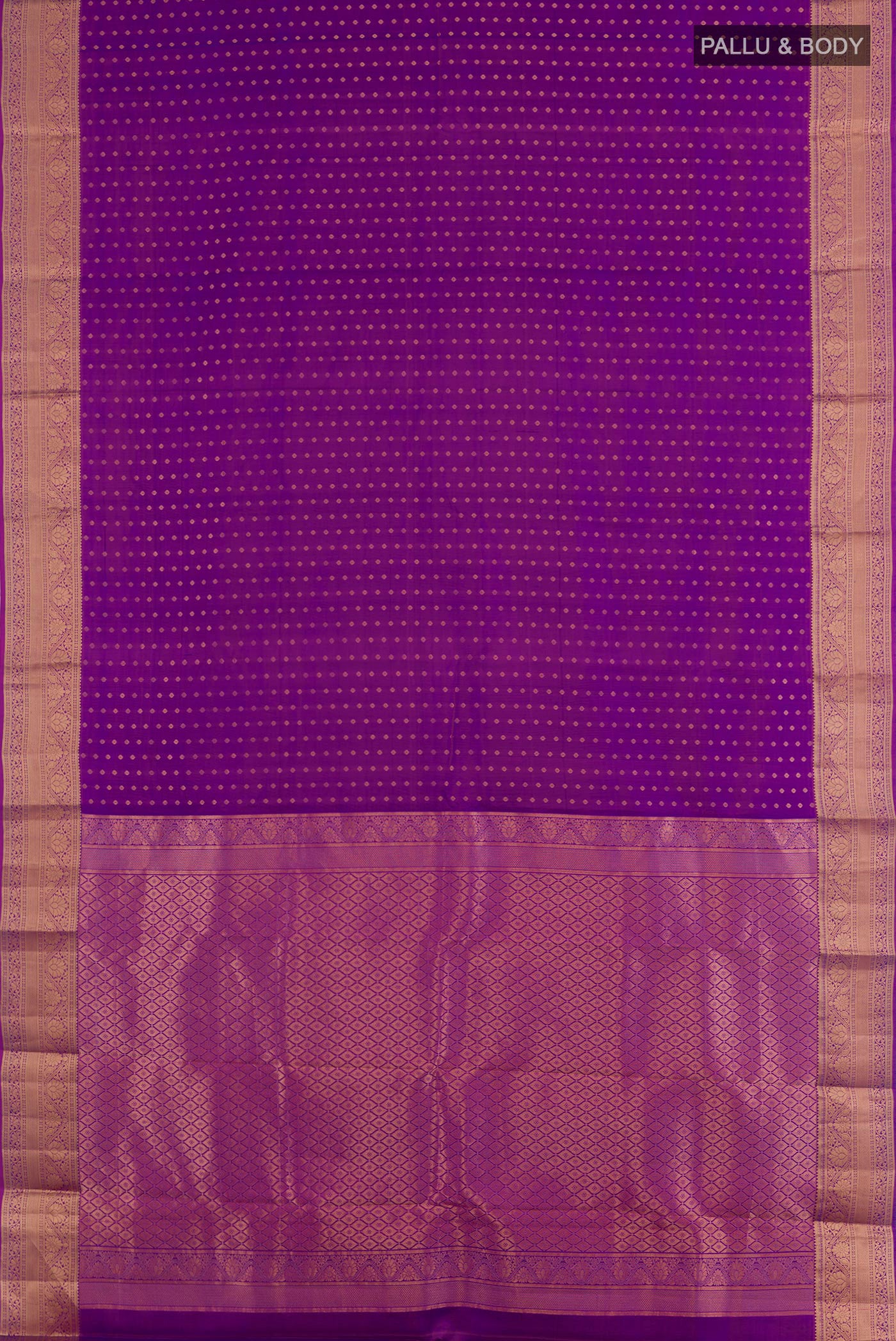 Flat view of Purple Kanchipuram Silk Saree with Zari Butta on the body and Zari Border. 