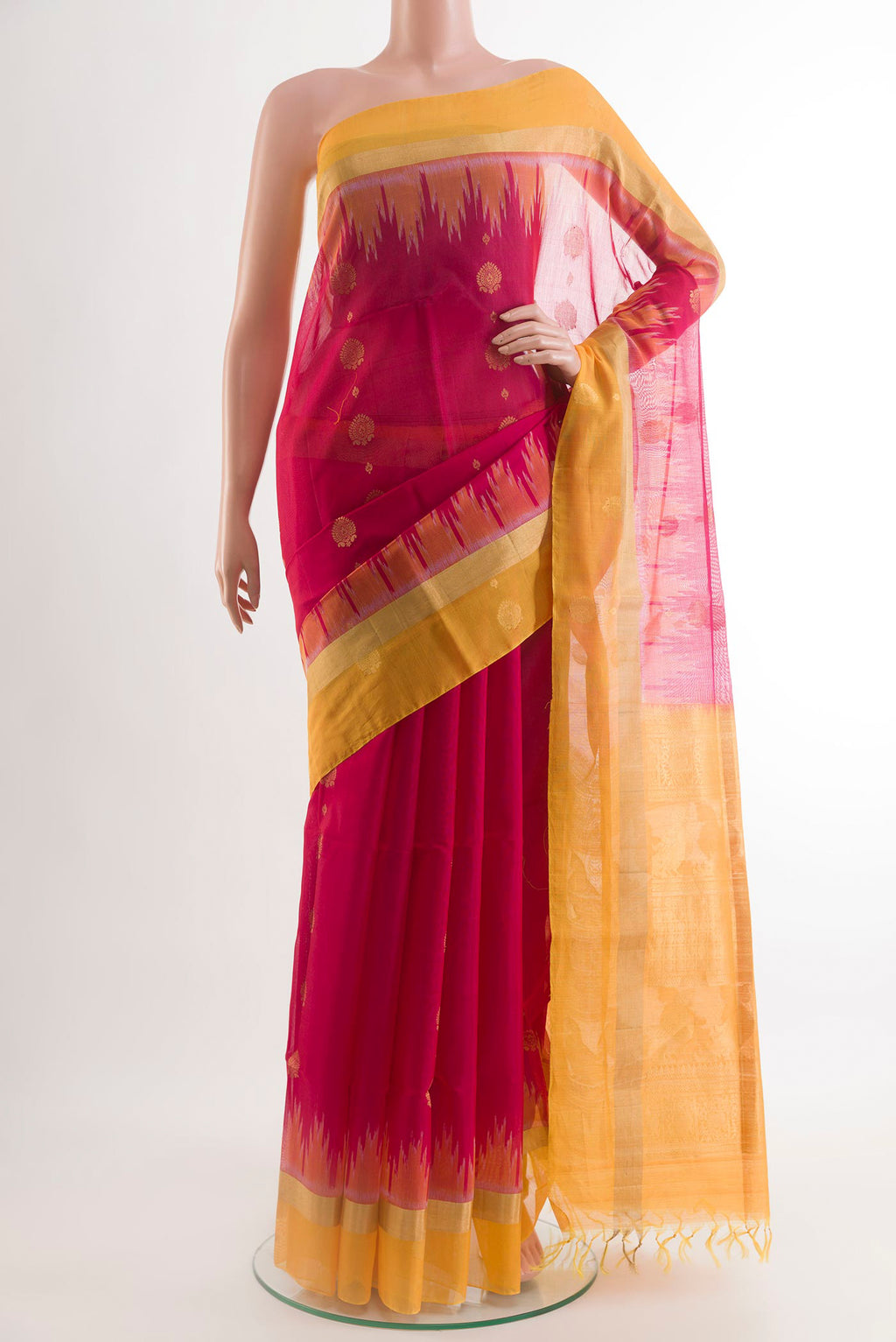 Pink Blended Kora Cotton Saree with Zari Butta on the body and Zari Border.  displayed on a mannequin