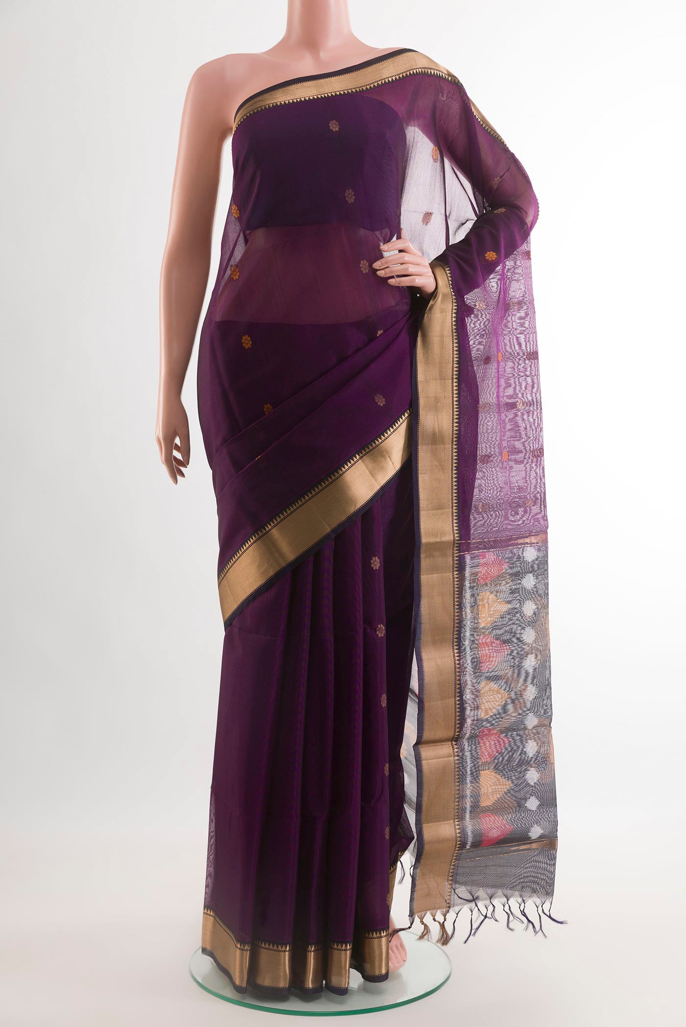 Purple Kora Cotton Saree with Zari Butta on the body and Zari Border.  displayed on a mannequin