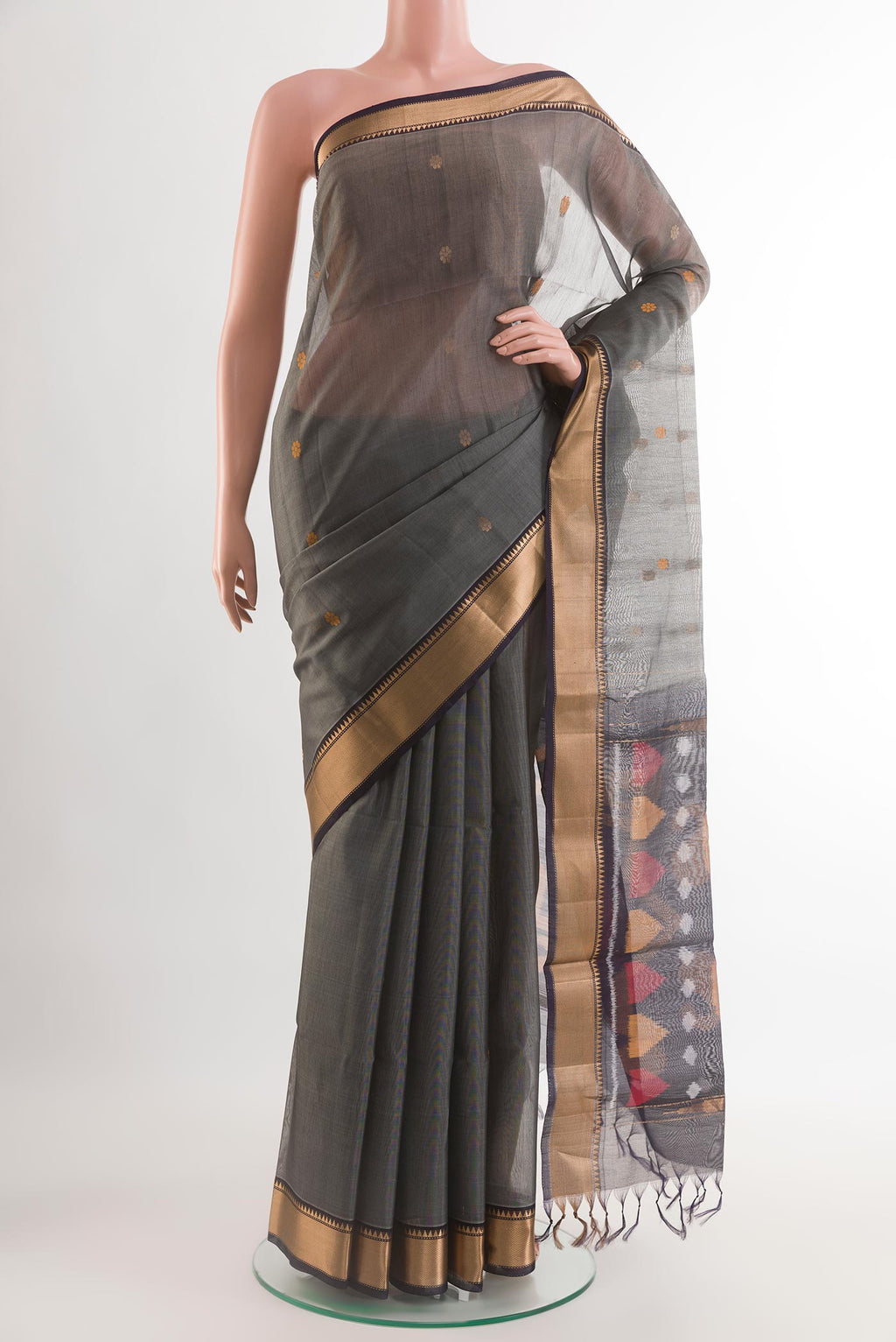 Grey Blended Kora Silk Saree with Zari Butta on the body and Zari Border.  displayed on a mannequin