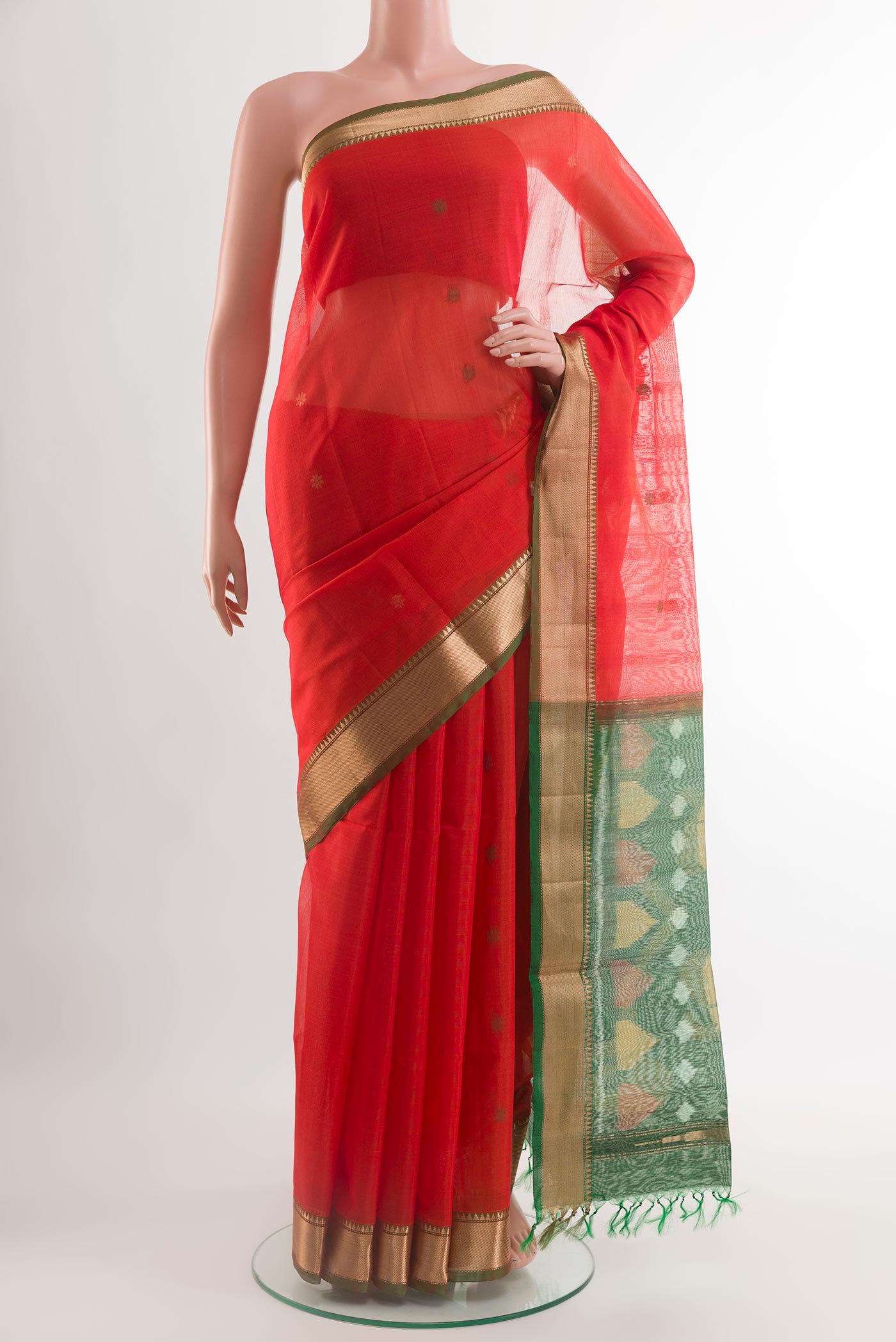 Red Kora Silk Saree with Zari Butta on the body and Zari Border.  displayed on a mannequin