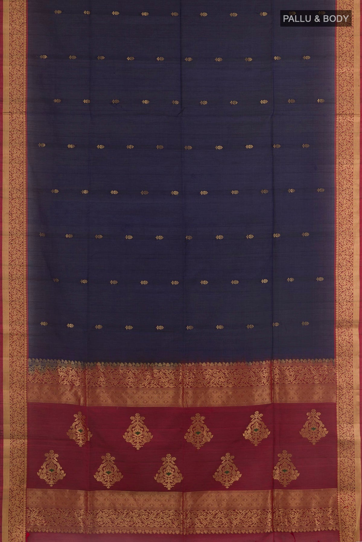 Flat view of Blue Soft Silk Saree with Zari Butta on the body and Zari Border. 