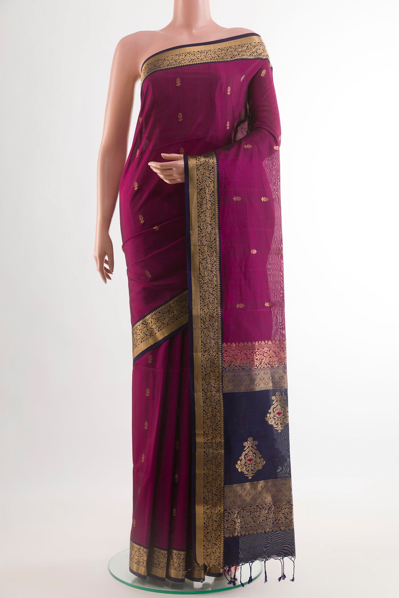 Purple Soft Silk Saree with Zari Butta on the body and Zari Border.  displayed on a mannequin