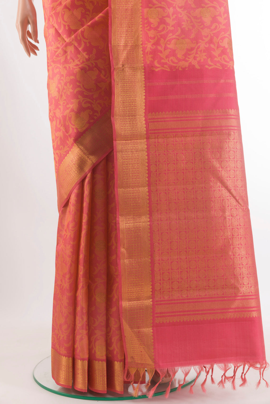 Pleats and pallu of Pure Silk Brick Orange Kanjivaram Saree with Jacquard With Zari Butta on the body and Zari Border. 