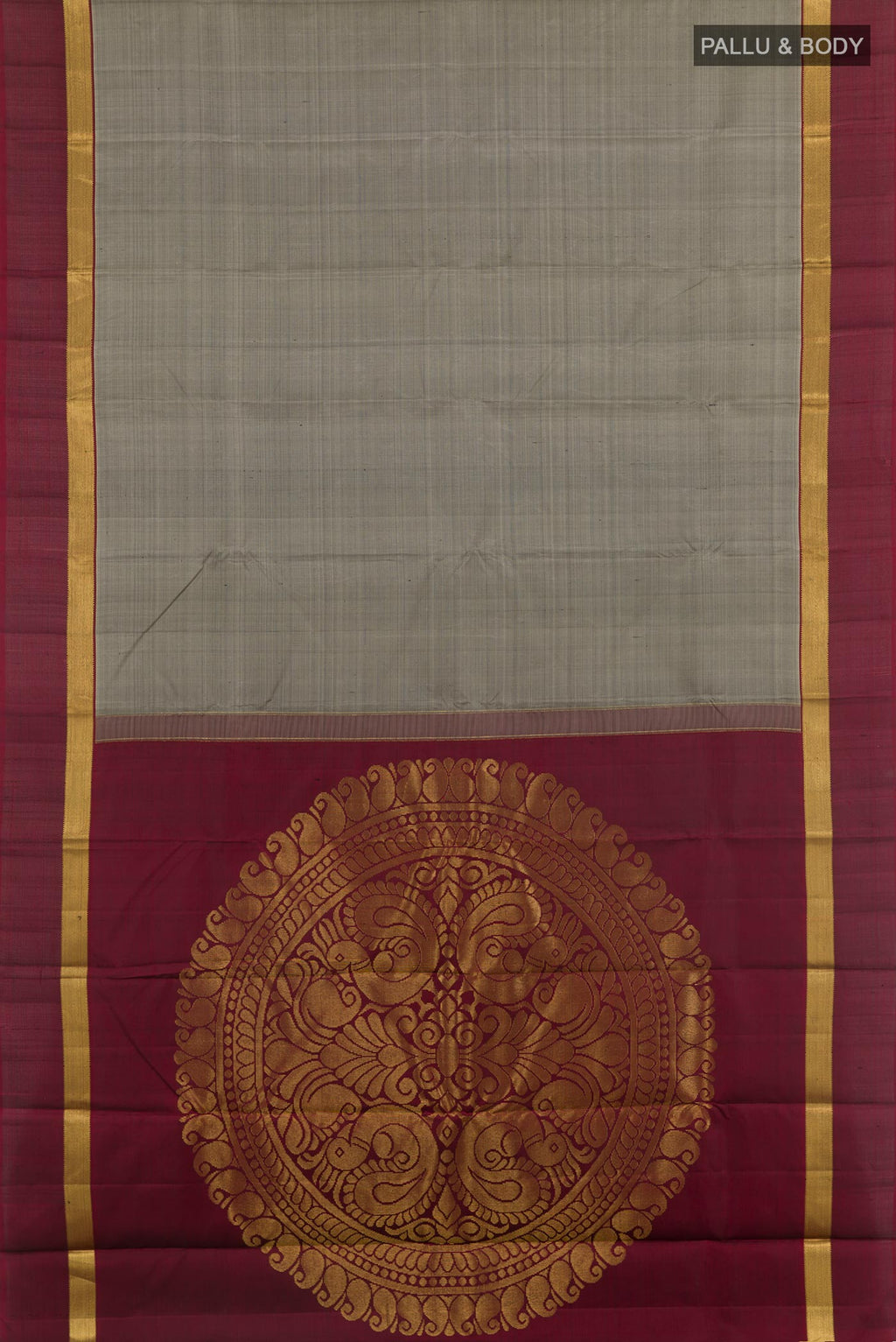 Flat view of Grey Kanchipuram Silk Saree with Zari Butta on the body and Zari Border. 