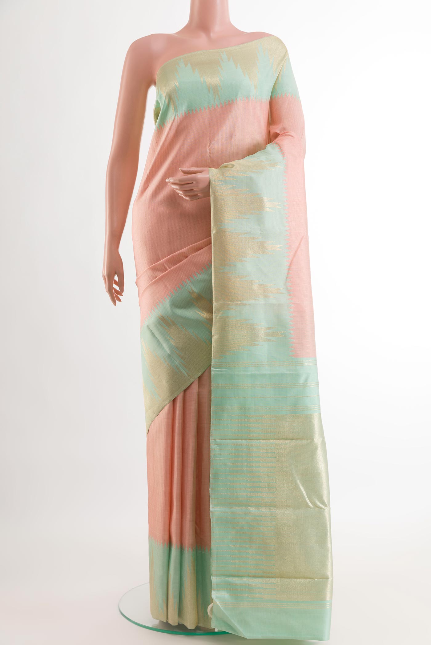 Pink Kanchipuram Silk Saree with Checked design on the body and Zari Border.  displayed on a mannequin