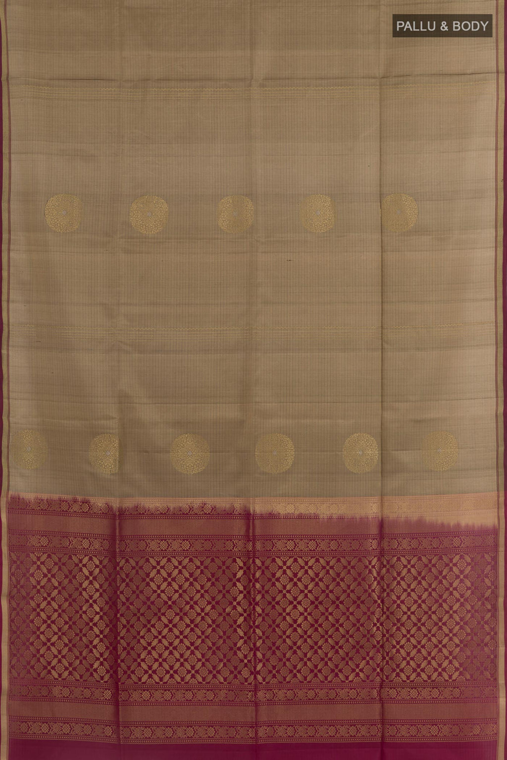 Flat view of Brown Soft Silk Saree with Zari Butta on the body and Zari Border. 