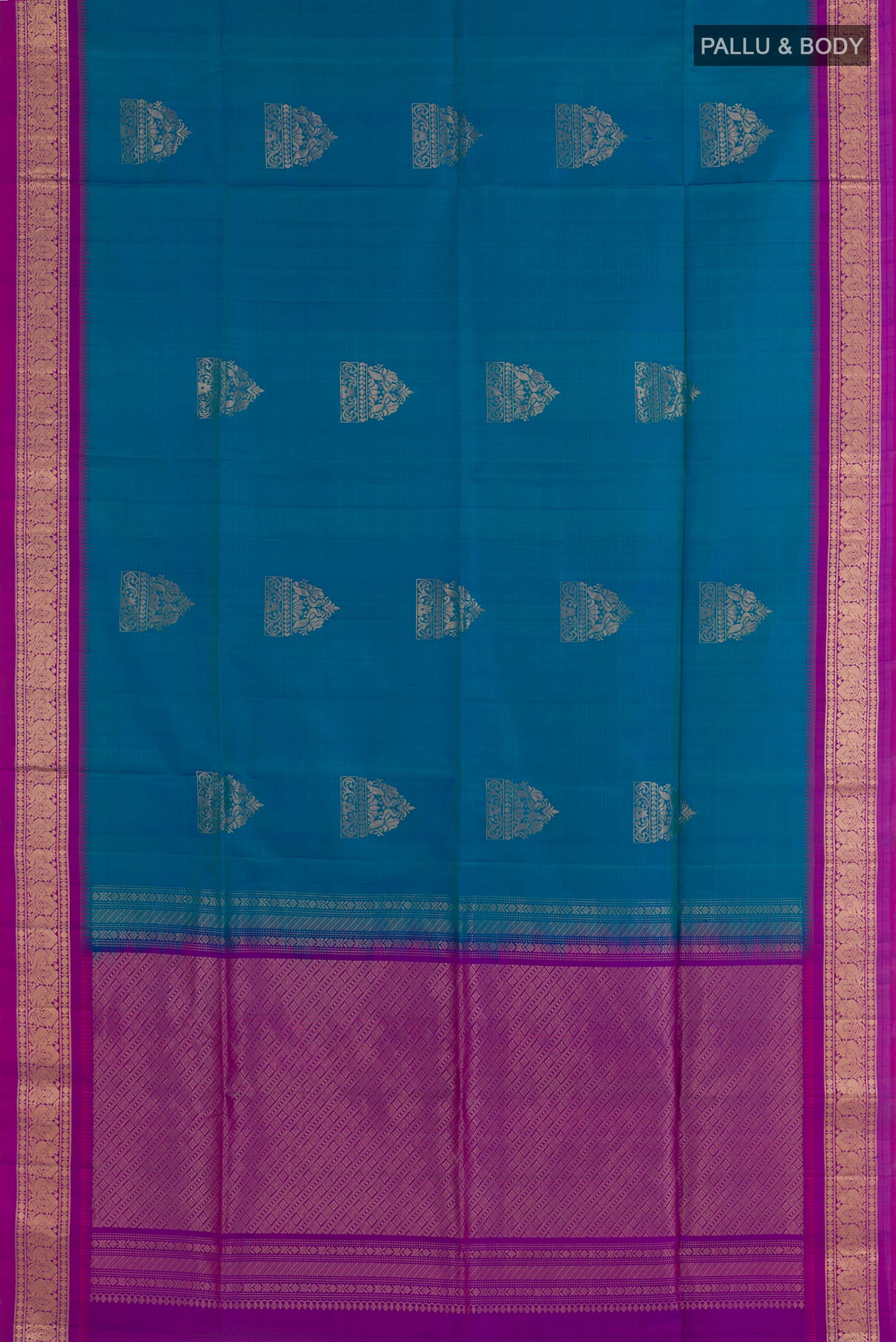 Flat view of Blue Soft Silk Saree with Zari Butta on the body and Zari Border. 