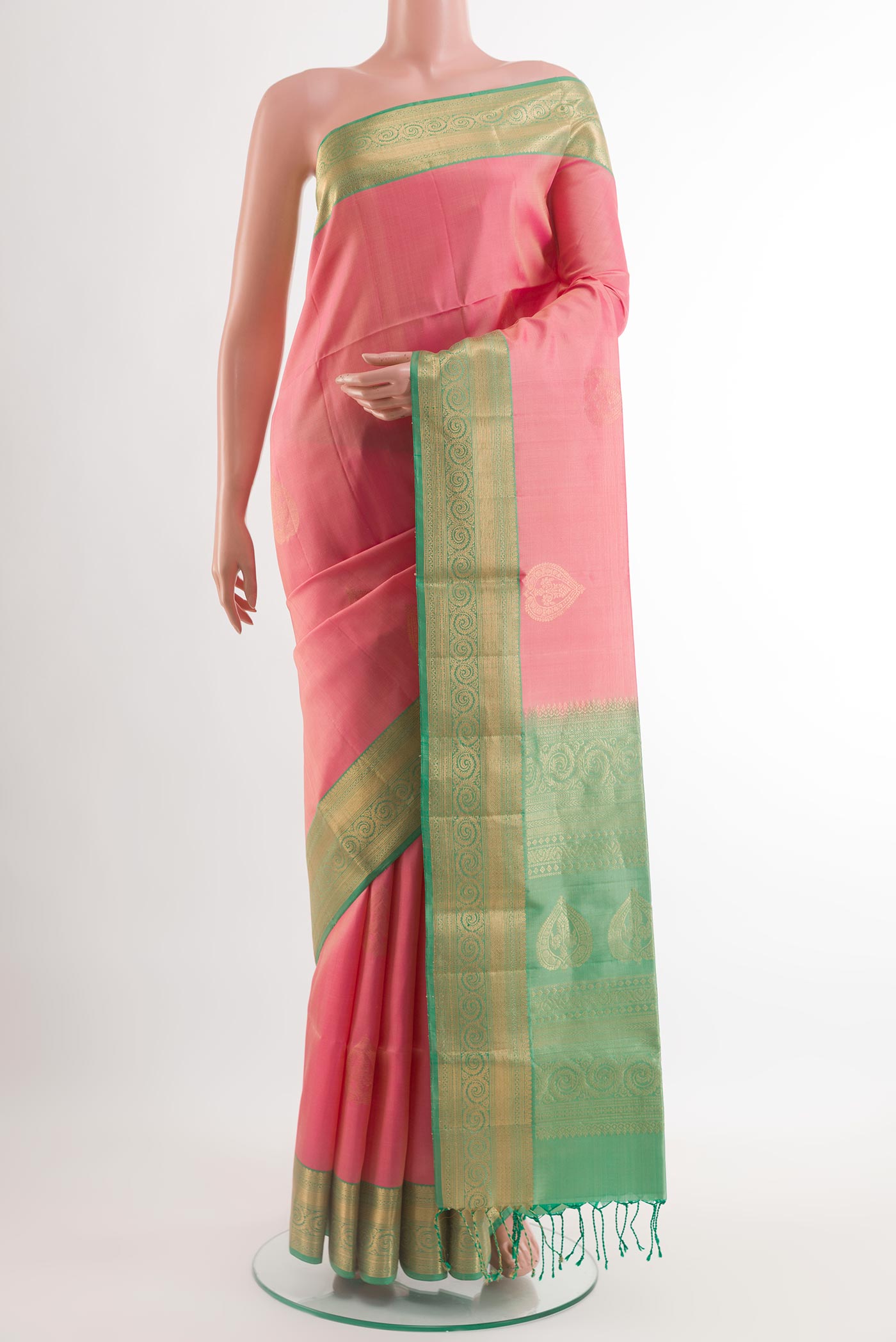 Pink Soft Silk Saree with Zari Butta on the body and Zari Border.  displayed on a mannequin