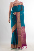 Pure Silk Blue Soft Saree with Zari Butta on the body and Zari Border.  displayed on a mannequin