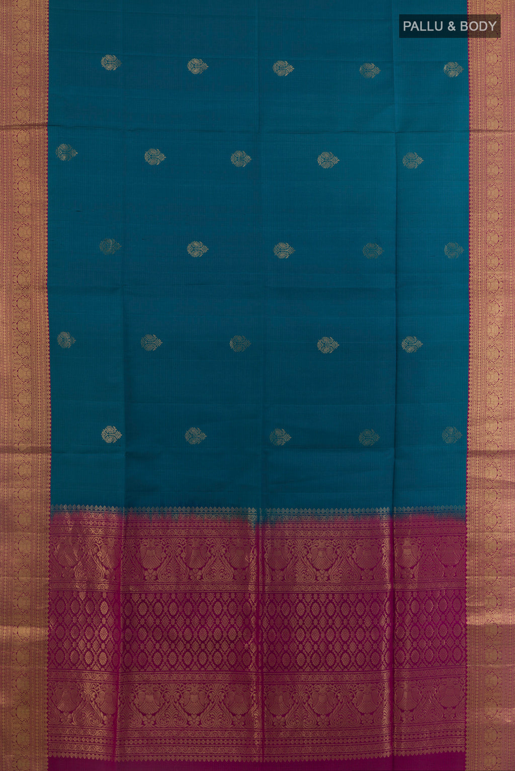 Flat view of Pure Silk Blue Soft Saree with Zari Butta on the body and Zari Border. 