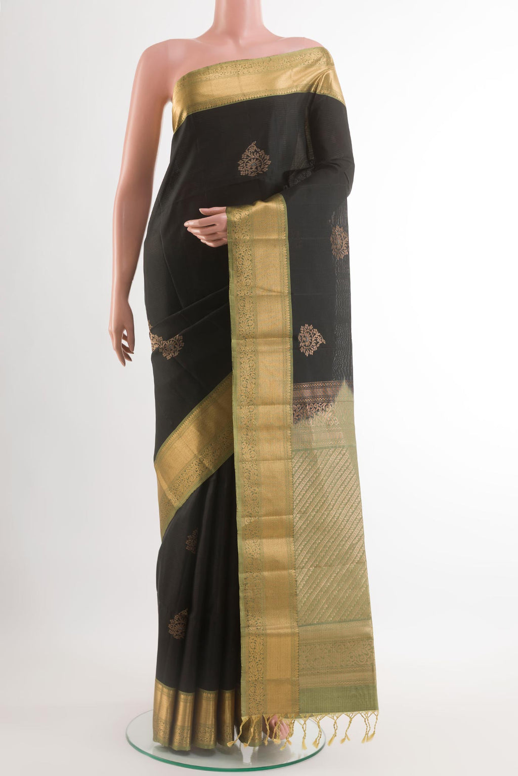 Black Soft Silk Saree with Zari Butta on the body and Zari Border.  displayed on a mannequin