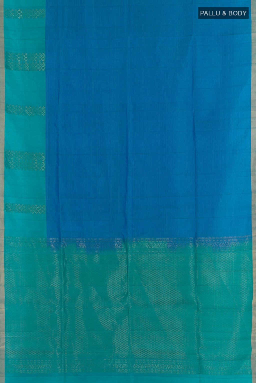 Flat view of Blue Soft Silk Saree with Zari Brocade on the body and Zari Border. 