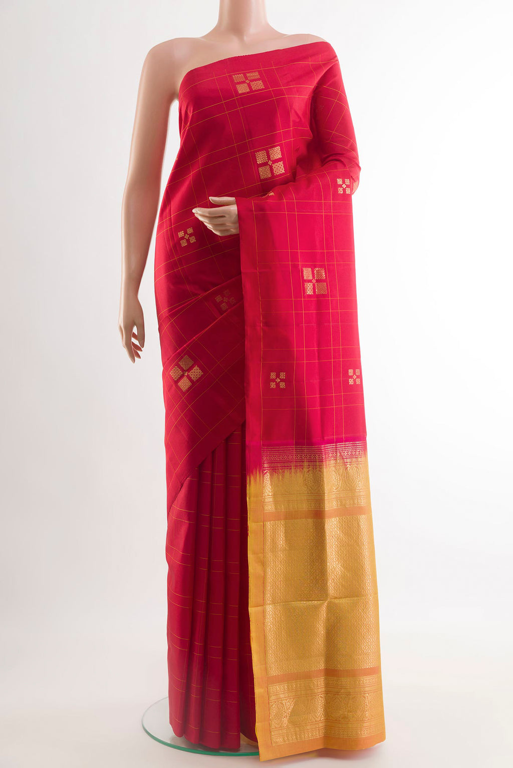 Red Soft Silk Saree with Zari Butta on the body and Zari Border.  displayed on a mannequin