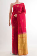 Red Soft Silk Saree with Zari Butta on the body and Zari Border.  displayed on a mannequin