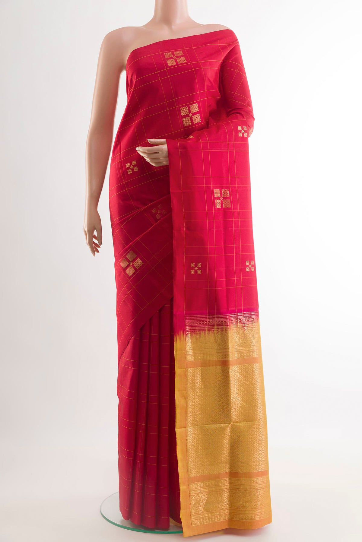 Red Soft Silk Saree with Zari Butta on the body and Zari Border.  displayed on a mannequin