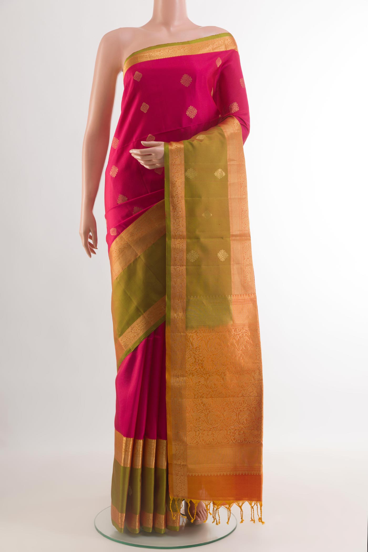 Pink Soft Silk Saree with Zari Butta on the body and Zari Border.  displayed on a mannequin