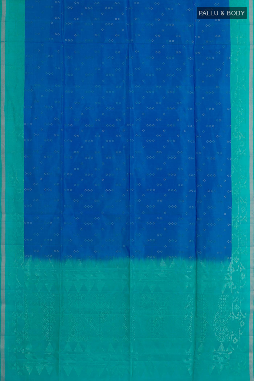 Flat view of Blue Soft Silk Saree with Zari Butta on the body and Zari Border. 