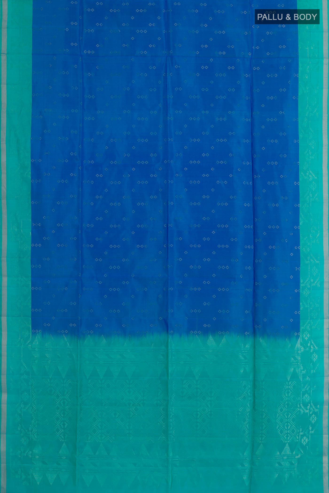 Flat view of Blue Soft Silk Saree with Zari Butta on the body and Zari Border. 