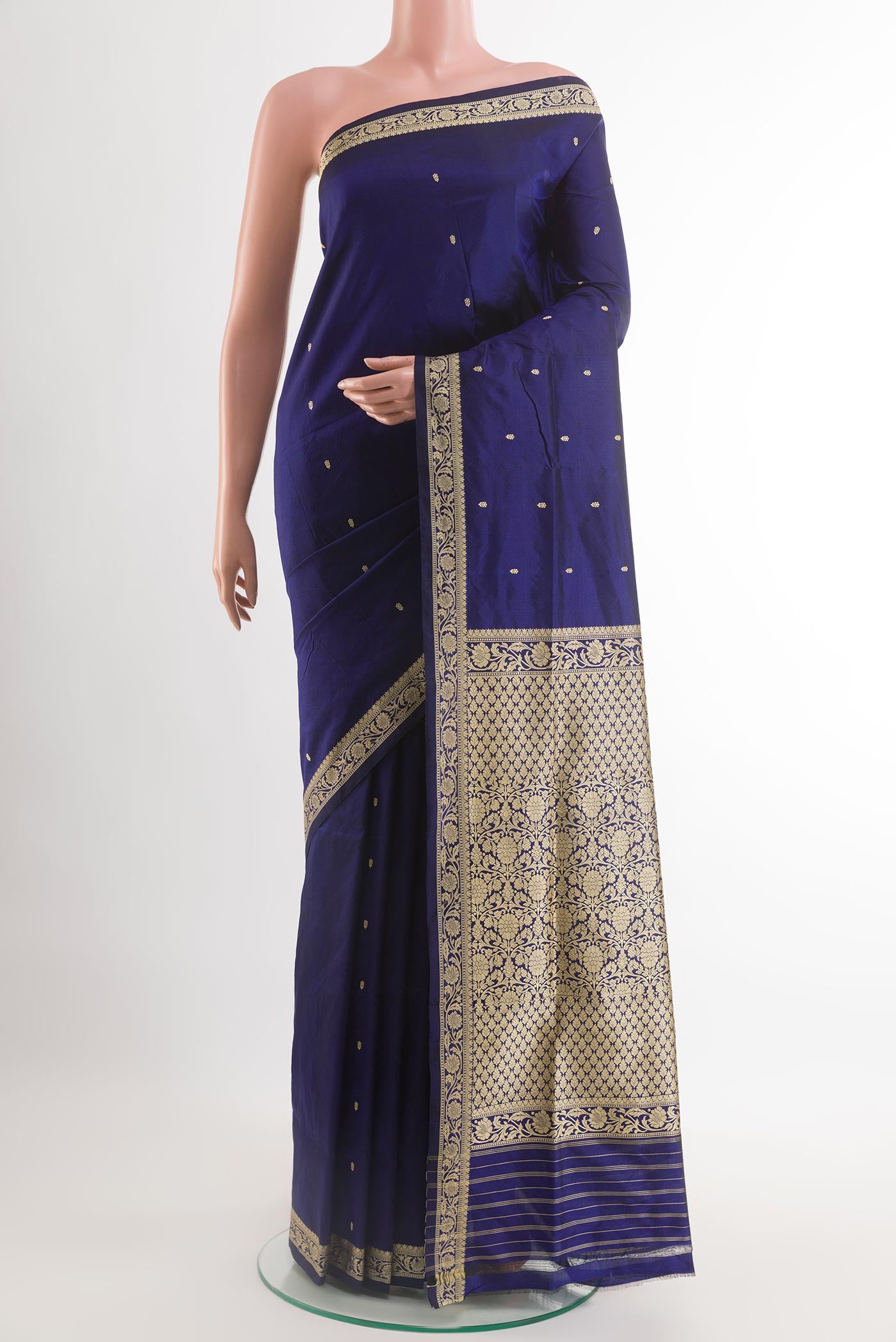 Dark Blue Banarasi Katan Silk Saree with Zari Butta on the body and Zari Border.  displayed on a mannequin