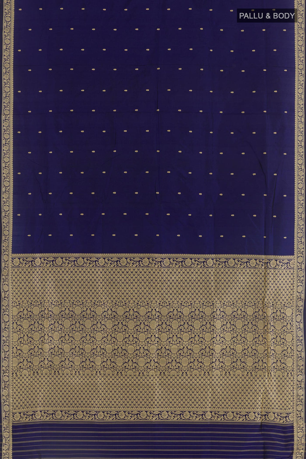 Flat view of Dark Blue Banarasi Katan Silk Saree with Zari Butta on the body and Zari Border. 