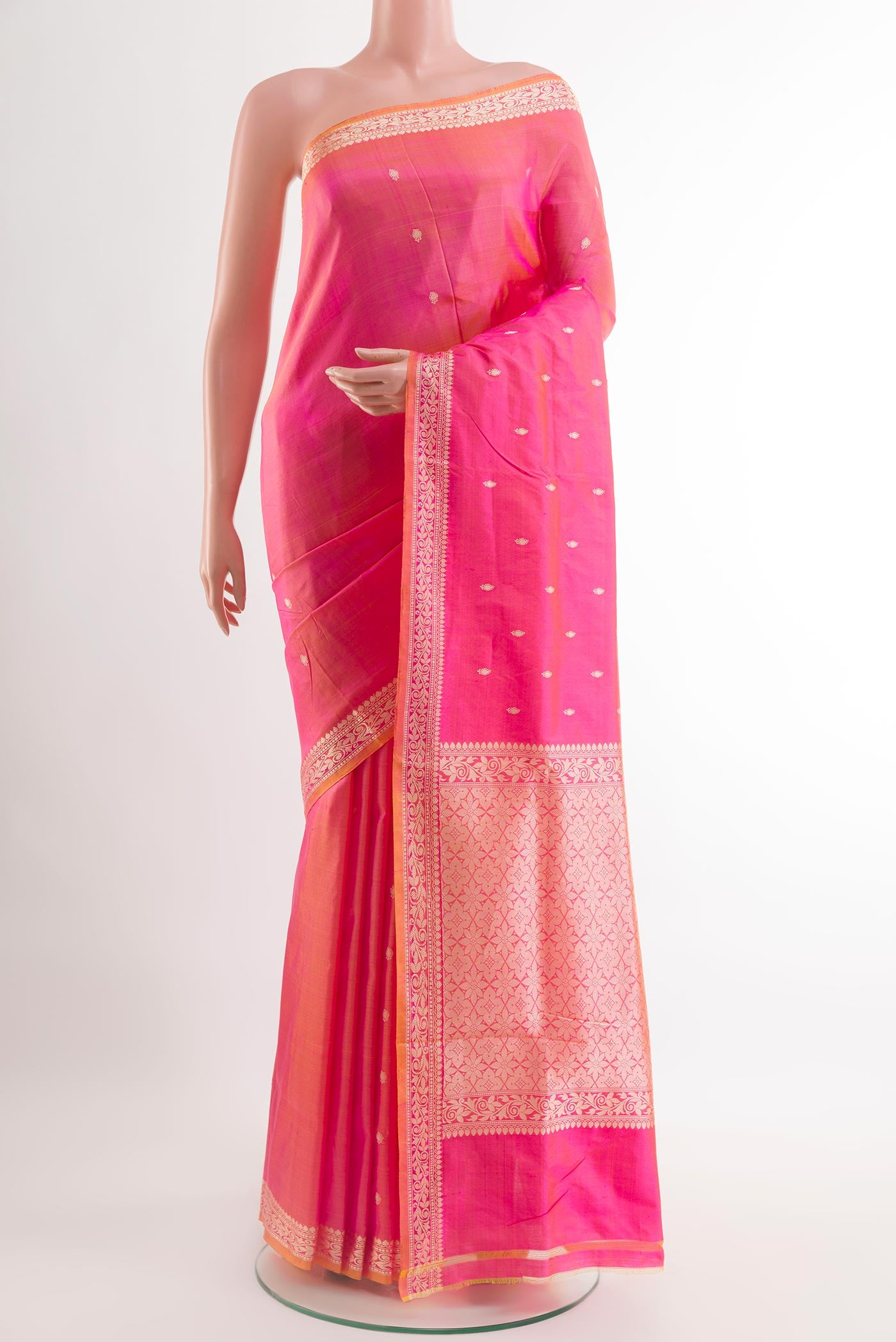 Pink Banarasi Katan Silk Saree with Zari Butta on the body and Zari Border.  displayed on a mannequin