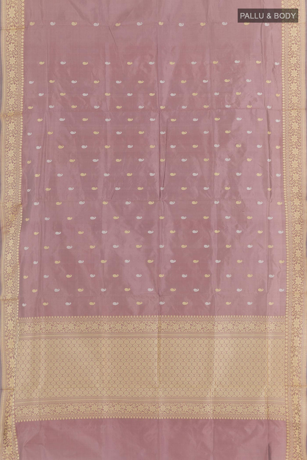 Flat view of Lavender Banarasi Katan Silk Saree with Zari Butta on the body and Zari Border. 