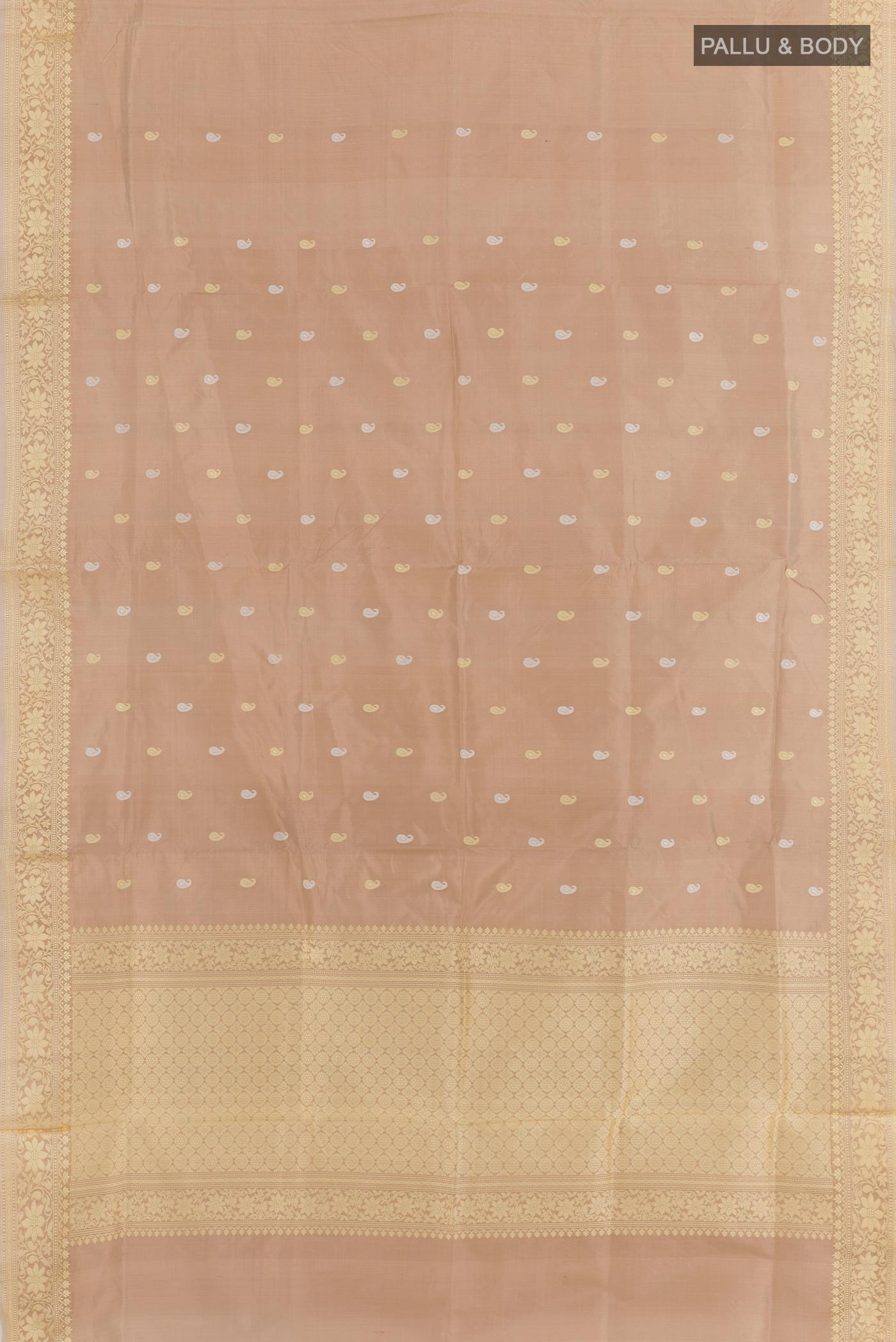 Flat view of Beige Banarasi Katan Silk Saree with Zari Butta on the body and Zari Border. 