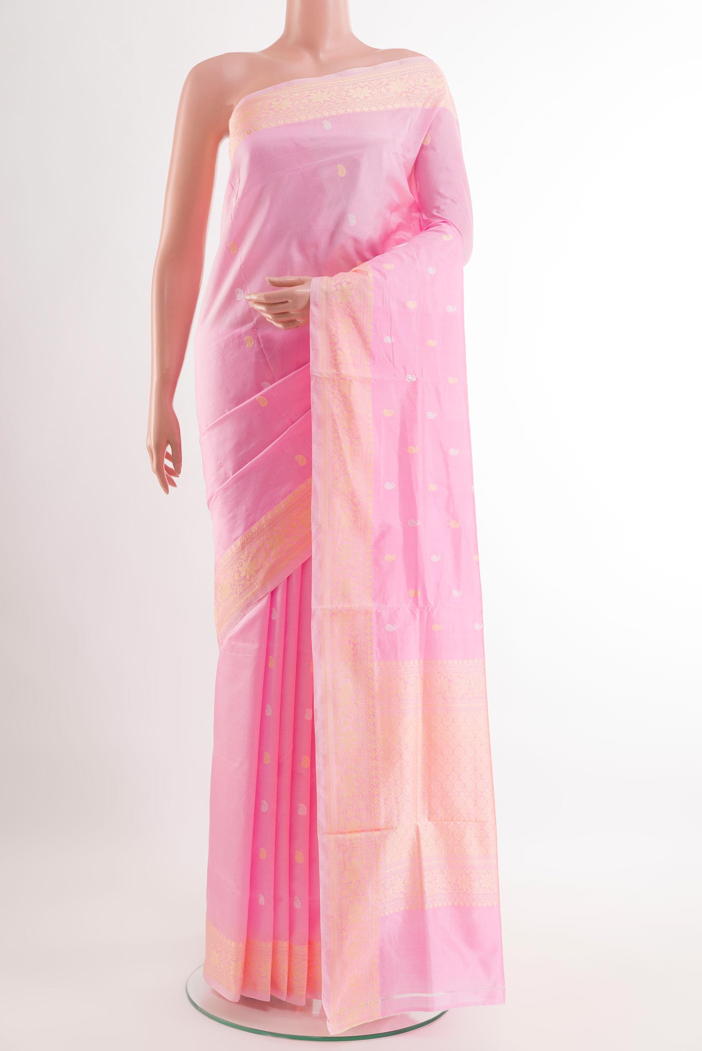 Rose pink Banarasi Katan Silk Saree with Zari Butta on the body and Zari Border.  displayed on a mannequin